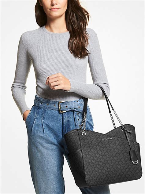 michael kors silver jet set bag|Michael Kors jet set pouch.